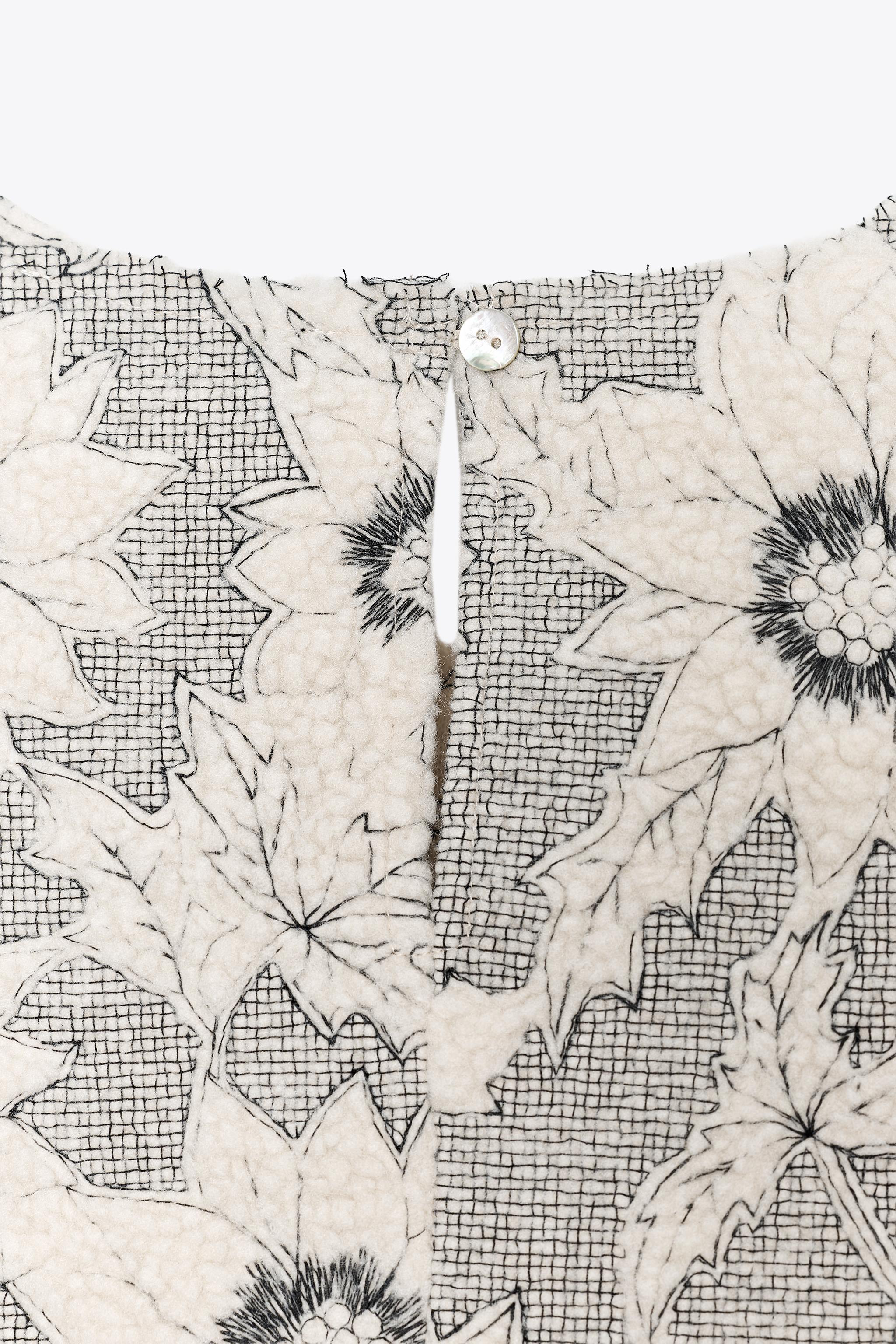 TOP PÉPLUM TEXTURÉ FLEURS